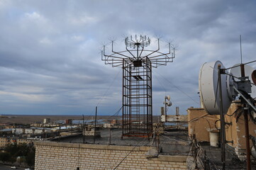 Zhezkazgan, Kazakhtan - 10.10.2016 : Telecommunications equipment on the roof of one of the residential buildings