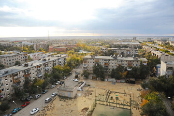 Zhezkazgan, Kazakhtan - 10.10.2016 : Residential buildings, commercial buildings and courtyards along the central streets of the city.