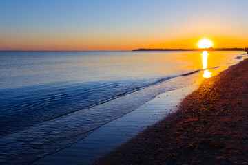 sandy sea beach at the early morning, quiet summer sea sunrise landscape