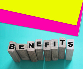 BENEFITS word made with building blocks. Awards self development motivation concept