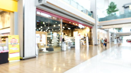 Abstract blur and defocused shopping mall of department store interior for background