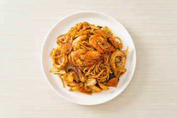 stir fried Tom Yum seafood dried spaghetti