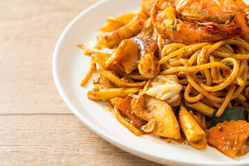 stir fried Tom Yum seafood dried spaghetti