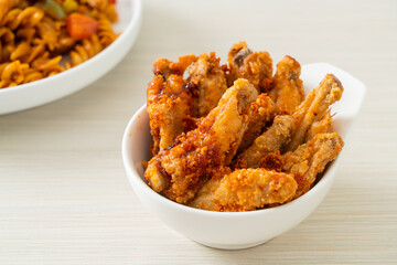 fried barbecue chicken wings in bowl