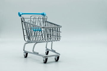 Empty shopping cart isolated on white background.