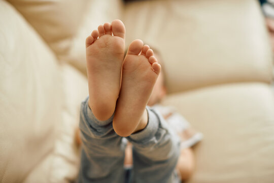 Close-up of small boy's feet.