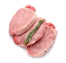 Slices of raw pork meat and rosemary on white background