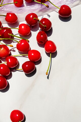 Fototapeta na wymiar ripe and sweet cherries on table