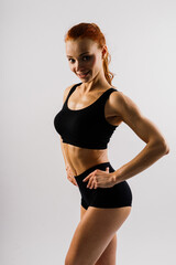 Obraz premium Female in studio, beautiful fitness sport woman's body is in underwear