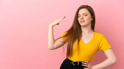 Teenager girl over isolated pink background with tired and sick expression