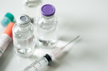 Selective Focus of Syringe and Medicine in vial , ready for vaccine injection , Cancer Treatment , Pain Treatment and can also be abused for an illegal use, healthcare and medical concept vaccination.
