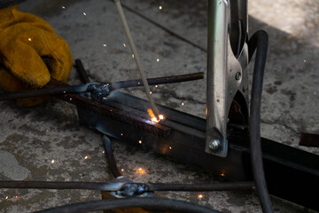 Welding work outdoors in a private house close-up.