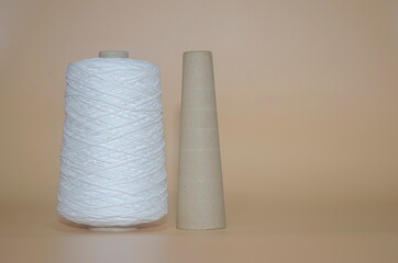 Fototapeta na wymiar Roll of white rope for tying parcels on white background.