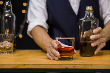Bartender Serve Whiskey, on wood bar, 