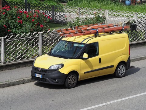 yellow Fiat Doblo Cargo van in Milan