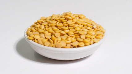 Soybeans in a bowl isolate on white background.