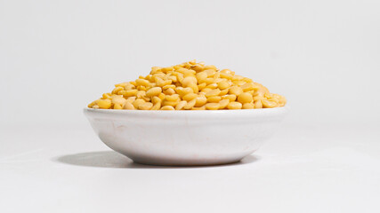 Soybeans in a bowl isolate on white background.
