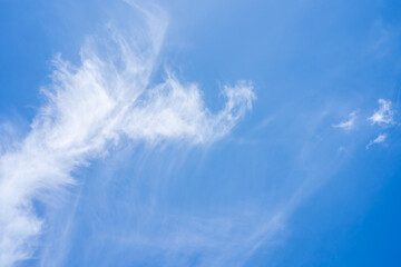 Fototapeta na wymiar Abstract beautiful clouds scape against blue sky background on sunny day.