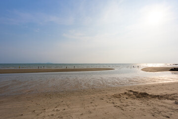 Bangsaen beach in the evening time. Very few people because of the Covid-19 situation. - obrazy, fototapety, plakaty