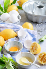 Ingredients for making traditional homemade lemon cake, fresh summer baking items
