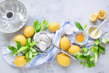 Ingredients for making traditional homemade lemon cake, fresh summer baking items