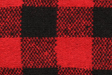 Red-black texture of the fabric for socks. Fabric texture. 
