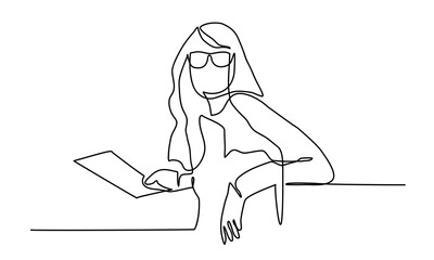 Young woman with glasses holding a document.