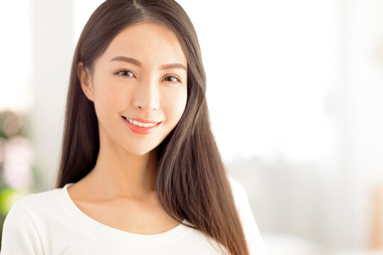 closeup  young asian woman face with clean and  healthy skin