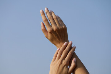 Woman sensual. Hands concept. Hand. Photo. Sky background