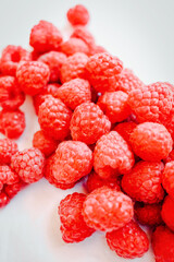 raspberries on a white background