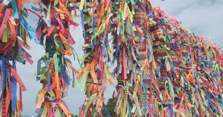 Closeup of colorful ribbons in Bahia, Brazil. Faith.