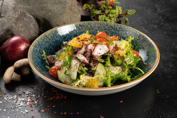 Salad with octopus and fresh vegetables