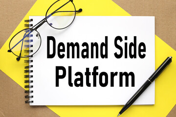 Demand Side Platform. text on notepad on bright stiff backing and craft background
