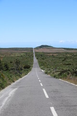 the long empty road on the plateau.