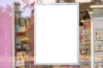 White mockup or white advertising poster on the facade of the store. Promotional information for marketing ads and details