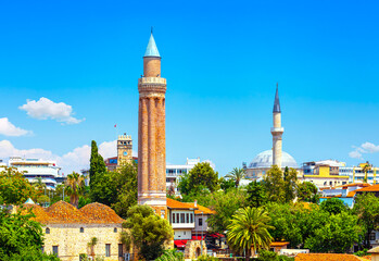 Fototapeta premium Panoramic view of Antalya Kaleici Old Town with the Clock Tower, Yivli Minaret and Tekeli Mehmet Pasa mosque. Antalya, Turkey