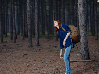 woman hiker backpack travel landscape forest active leisure