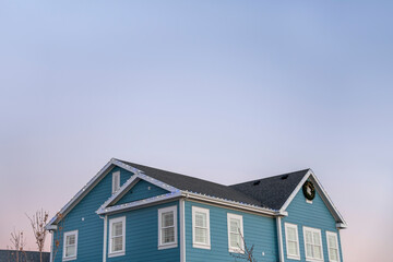 Low angle view of a traditional two-storey house exterior