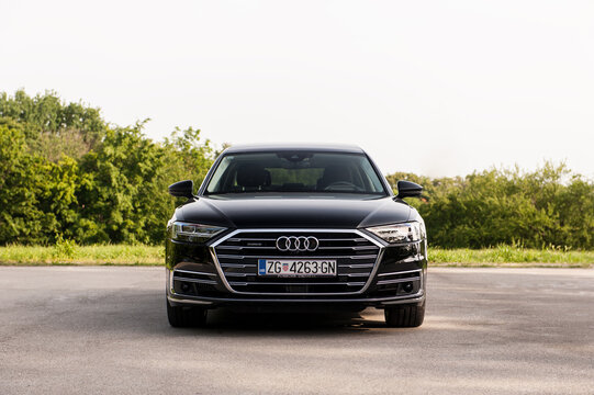Black Audi A8 50 TDI Quattro on the street. 2018. model year. Front grill with LED lights