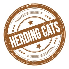 HERDING CATS text on brown round grungy stamp.