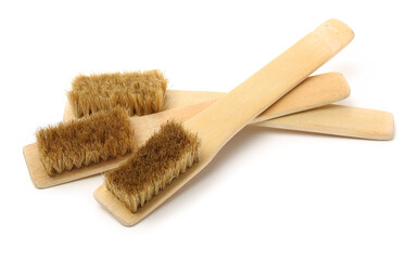 Natural bristle shoes brush with wood handle isolated on white background