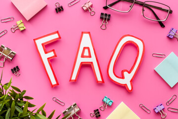 Information helpdesk concept with faq frequently asked questions text on working place