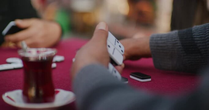 Local Men Drinking Tea and Playing Dominos Near The Citadel in Erbil, Iraq