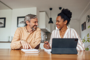 Adult woman, suggesting a good place for vacation to her husband.