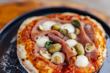 Freshly cooked pizza, looking delicious.