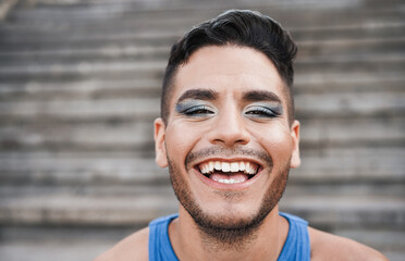 Portrait of young gay man with makeup - Lgbt community concept - Focus on face