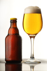 beer bottle with a full glass