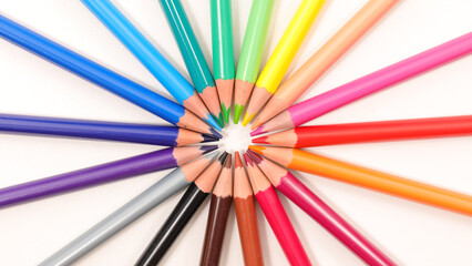Fototapeta premium colored pencils circle isolated on white background