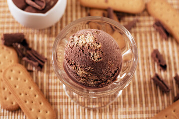 Brazilian ice cream with Italian straw flavor in a bowl with ingredients in the decoration