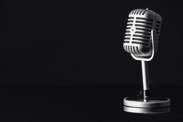 Retro microphone on dark background